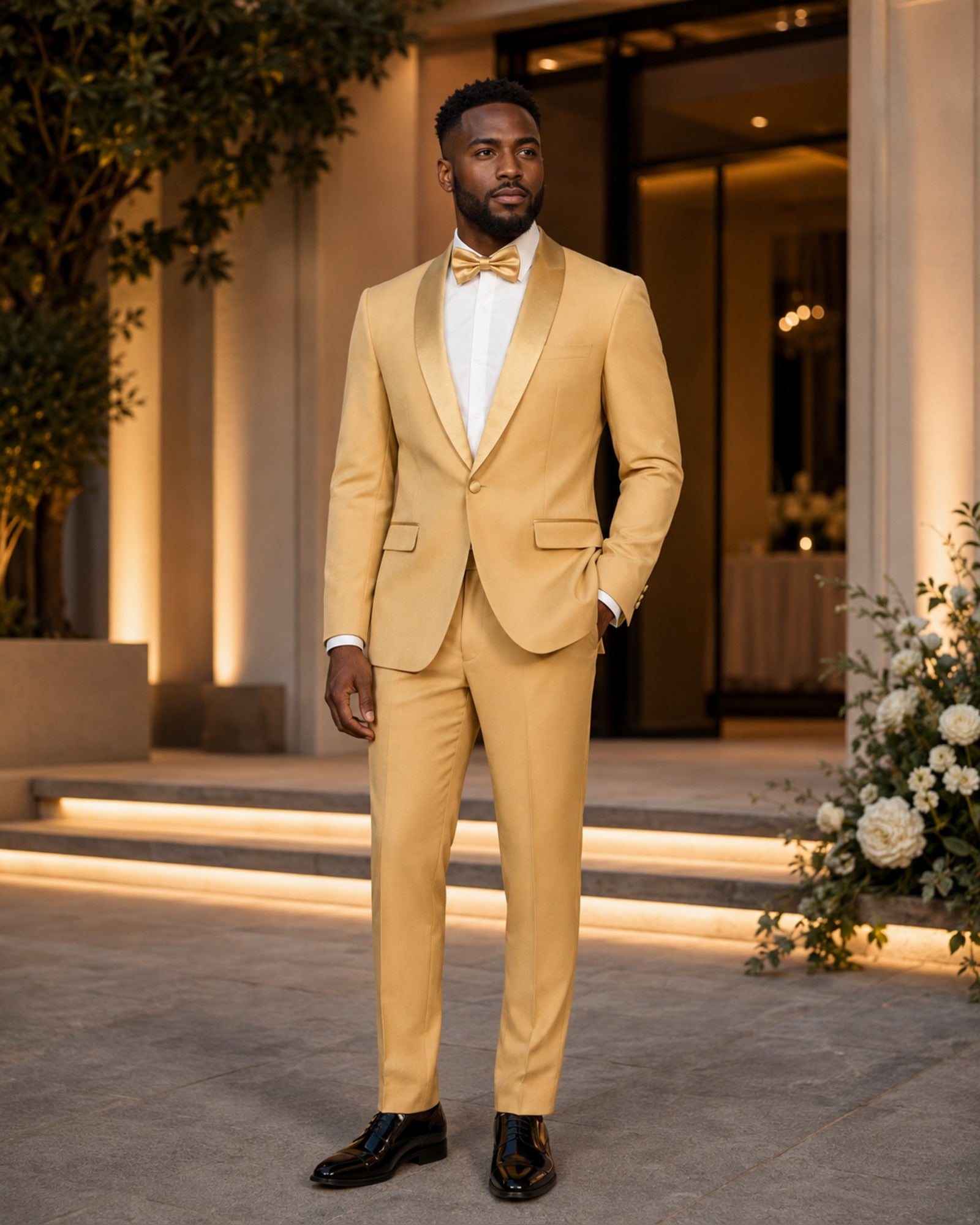 Man wearing the Light Gold Aurelio slim fit tuxedo at an elegant wedding venue