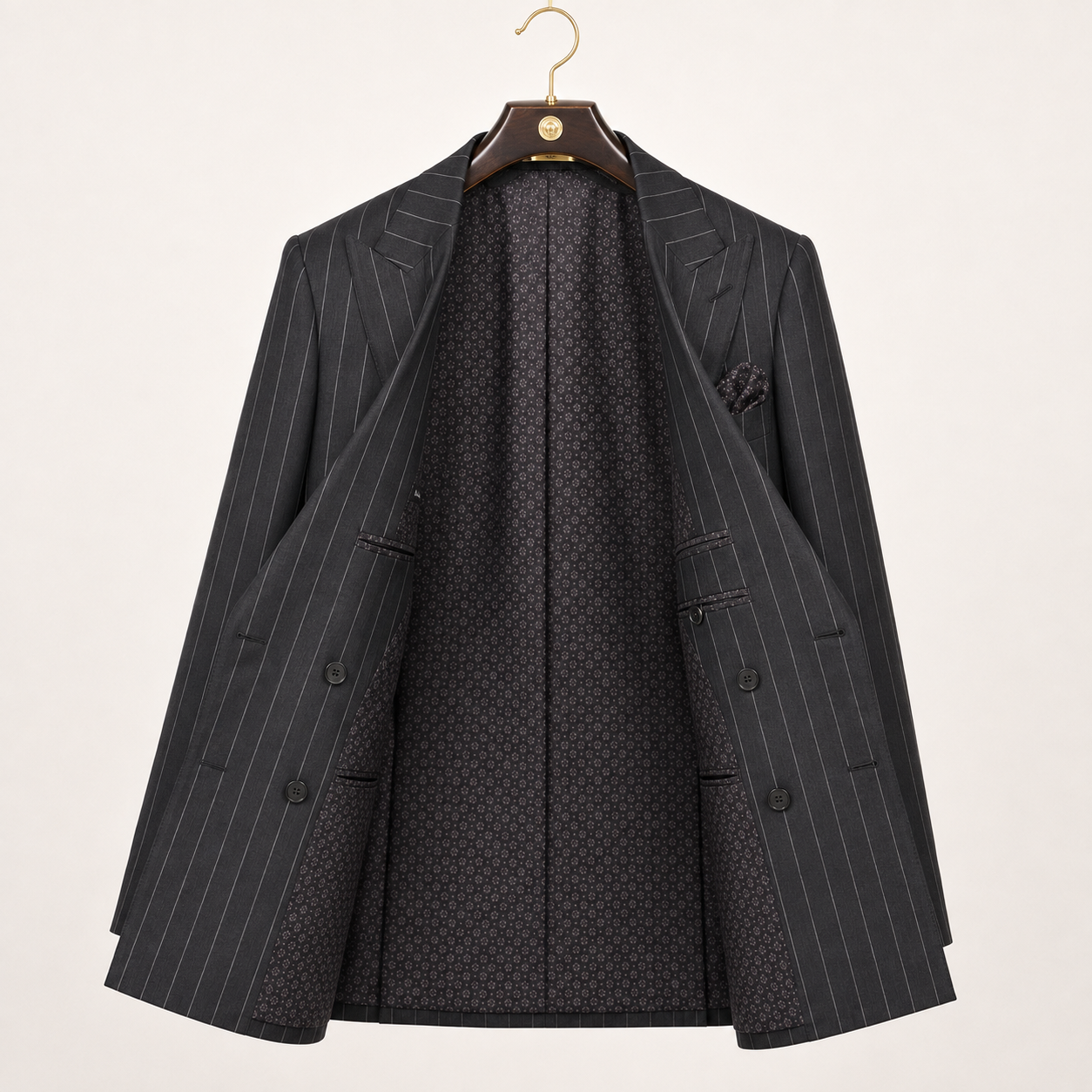 Black Cavallo pinstripe double-breasted suit jacket fully open on luxury walnut and gold hanger showing interior lining