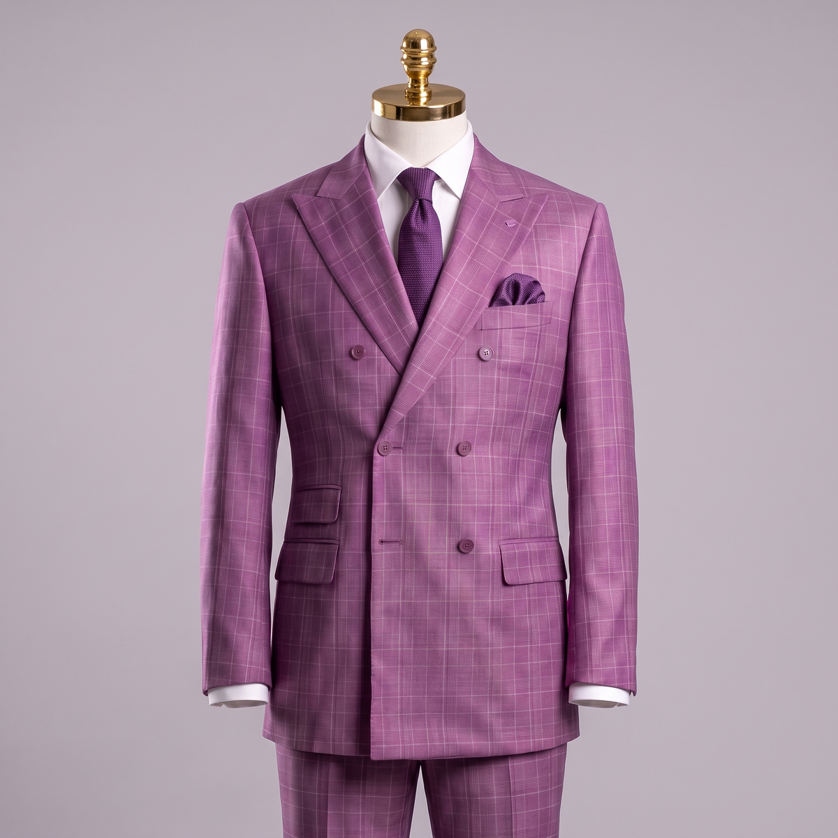 Plum glen plaid double-breasted suit on gold-top mannequin with matching trousers partially visible
