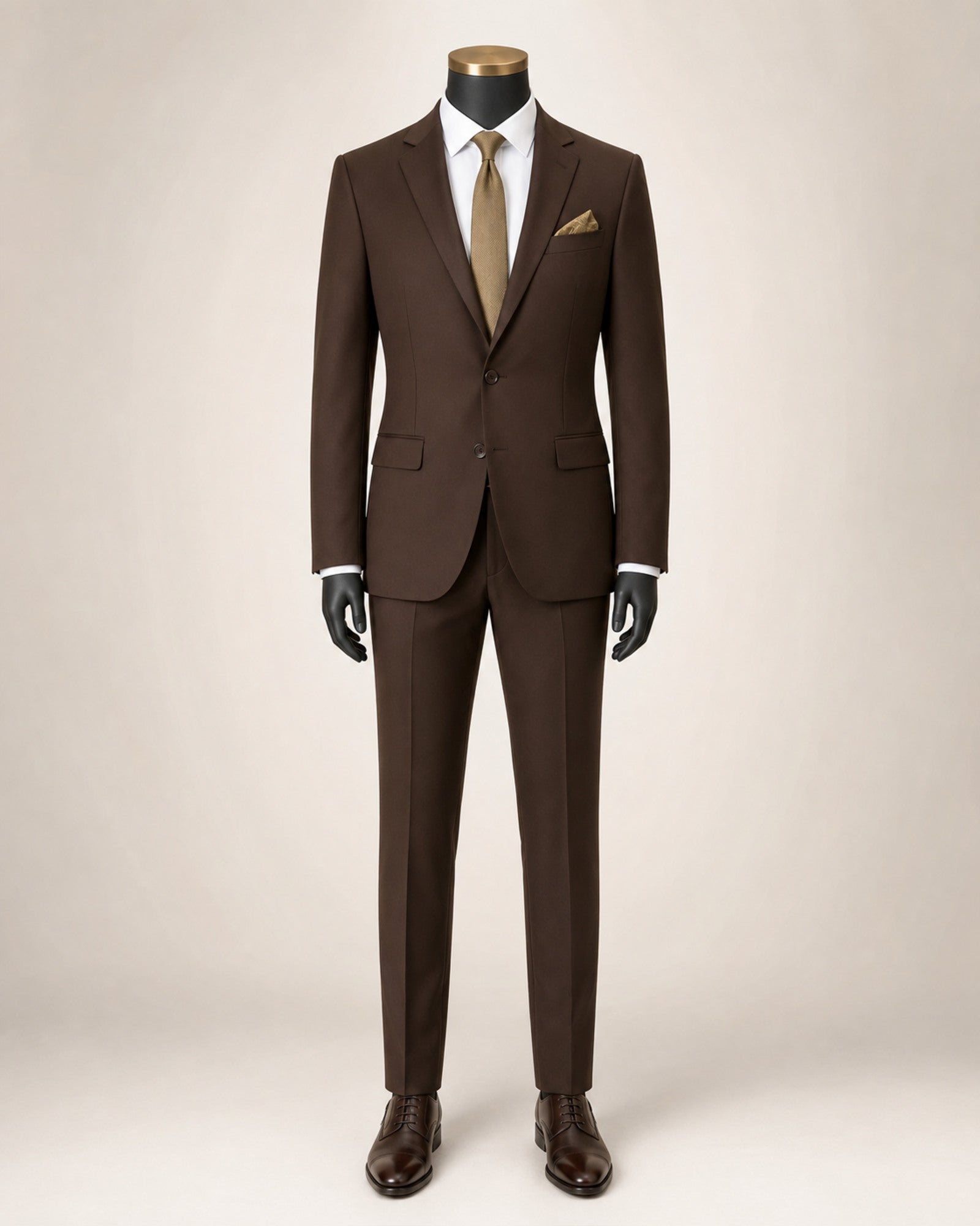 Men's brown slim fit stretch two-piece suit on black mannequin with gold top