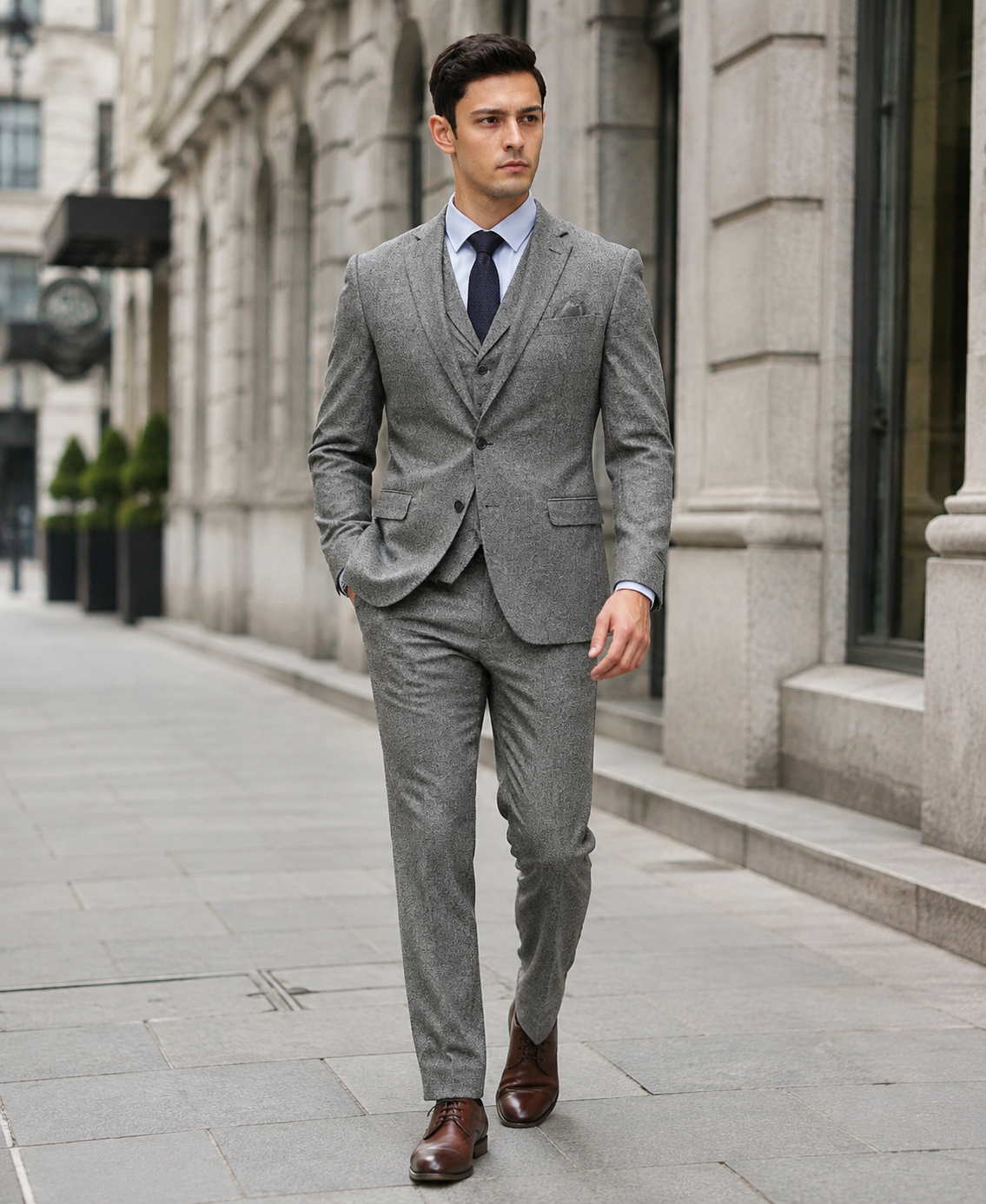 Men's Grey three-piece tweed suit on a city stroll