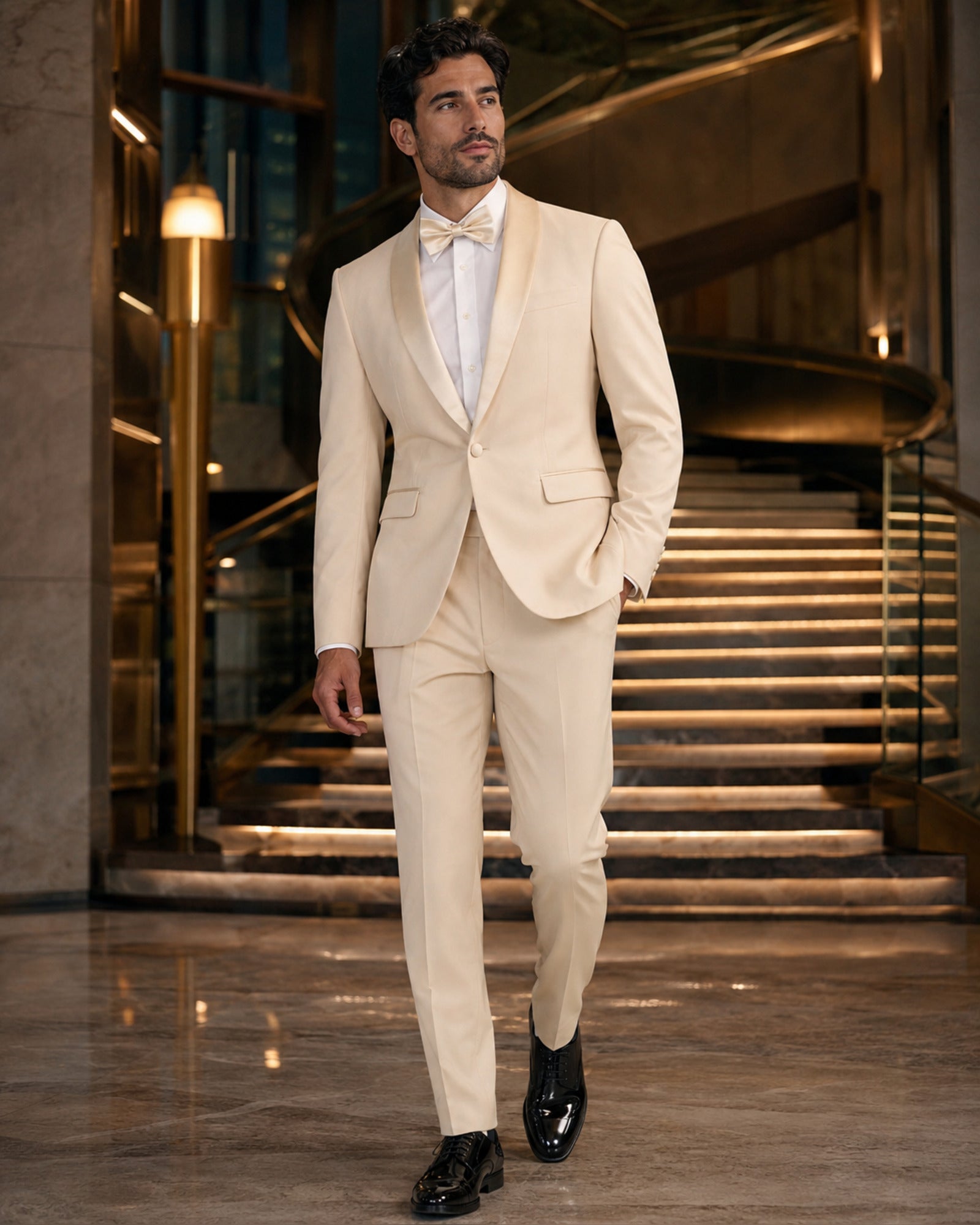 Man wearing the Champagne Beige Aurelio slim fit tuxedo in a luxury hotel