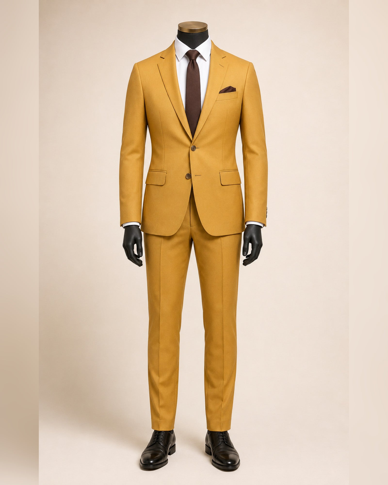 Men's gold slim fit stretch two-piece suit on black mannequin with gold top